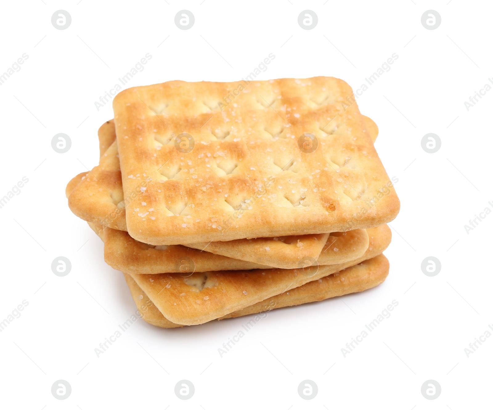 Stack of tasty salty crackers isolated on white Photo of Stack of tasty salty crackers isolated on white