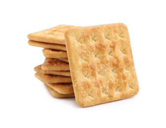 Photo of Stack of tasty salty crackers isolated on white