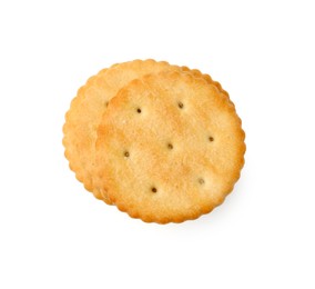 Photo of Stack of tasty salty crackers isolated on white, top view
