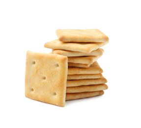 Photo of Stack of tasty salty crackers isolated on white