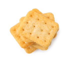 Photo of Tasty salty crackers isolated on white, top view