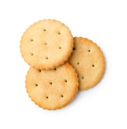 Photo of Tasty salty crackers isolated on white, top view