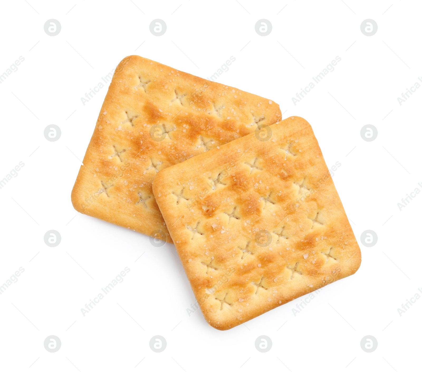 Tasty salty crackers isolated on white, top view Photo of Tasty salty crackers isolated on white, top view