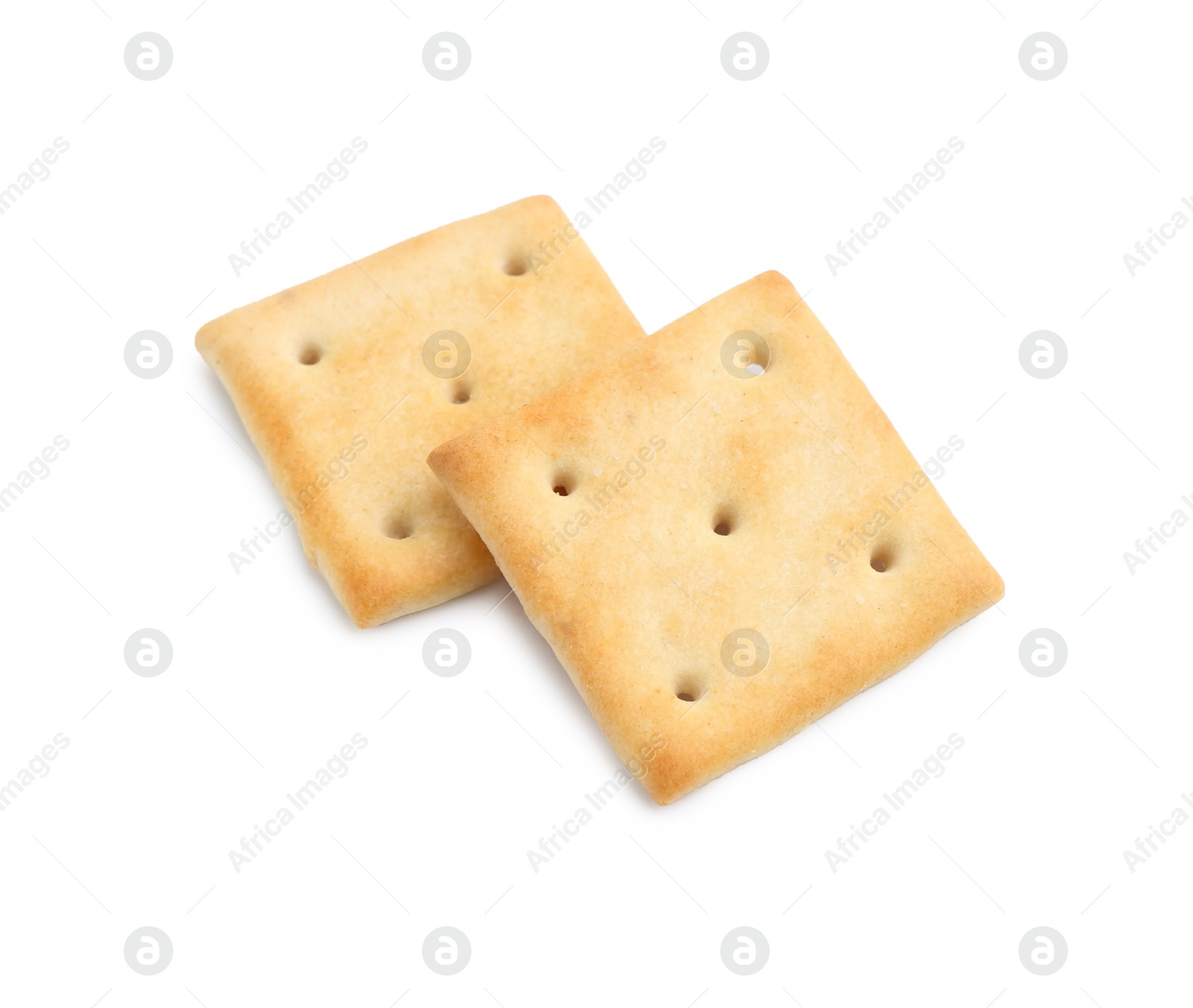 Two tasty salty crackers isolated on white Photo of Two tasty salty crackers isolated on white