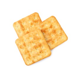 Photo of Tasty salty crackers isolated on white, top view
