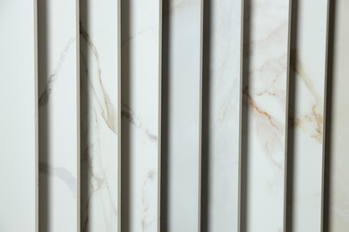 Photo of Many different samples of tiles as background, closeup