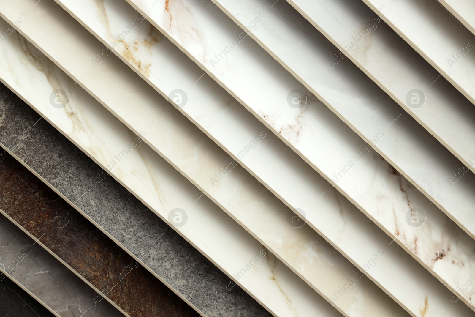 Many different samples of tiles as background, closeup Photo of Many different samples of tiles as background, closeup