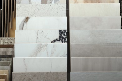 Photo of Many different samples of tiles on display in store