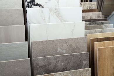 Photo of Many different samples of tiles on display in store