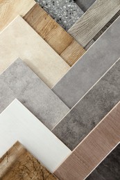 Photo of Many different samples of tiles as background, top view