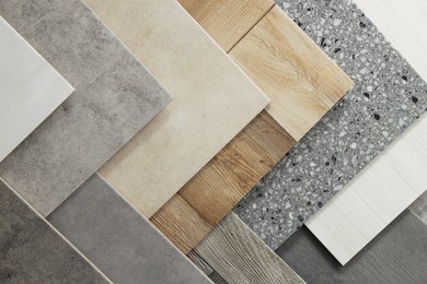 Photo of Many different samples of tiles as background, top view