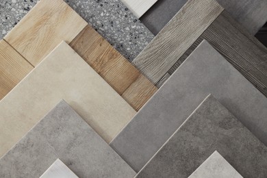 Photo of Many different samples of tiles as background, top view