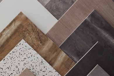 Photo of Many different samples of tiles as background, top view