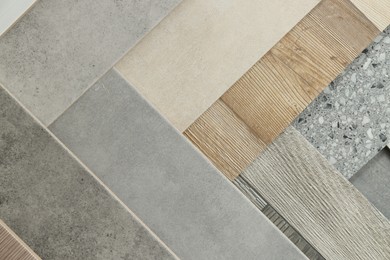 Photo of Many different samples of tiles as background, top view