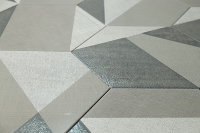 Photo of Texture of tiles with beautiful pattern as background, closeup