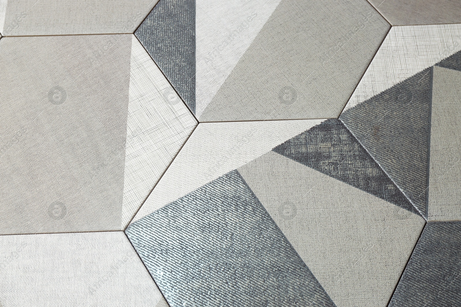 Texture of tiles with beautiful pattern as background, above view Photo of Texture of tiles with beautiful pattern as background, above view