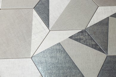 Photo of Texture of tiles with beautiful pattern as background, above view