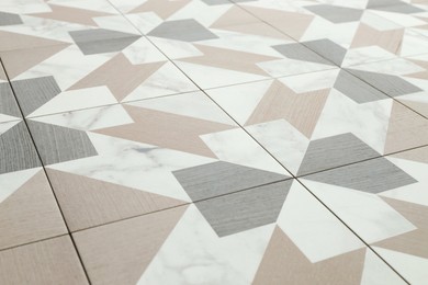 Photo of Texture of tiles with beautiful pattern as background, closeup