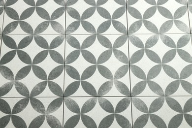 Photo of Texture of tiles with beautiful pattern as background, top view