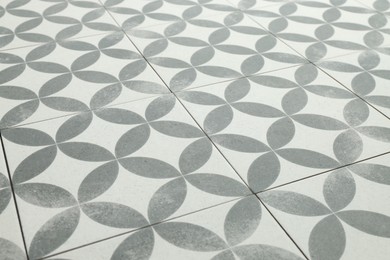 Photo of Texture of tiles with beautiful pattern as background, closeup