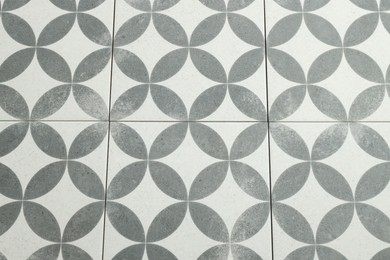 Photo of Texture of tiles with beautiful pattern as background, top view