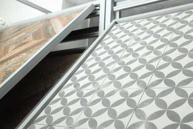 Photo of Different samples of tiles on display in store, closeup