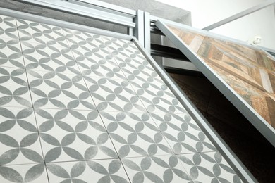 Photo of Different samples of tiles on display in store, closeup