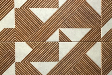 Photo of Texture of tiles with beautiful pattern as background, top view