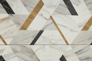 Photo of Texture of tiles with beautiful pattern as background, top view