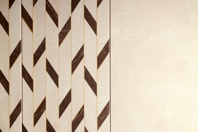 Photo of Texture of tiles with beautiful pattern as background, top view