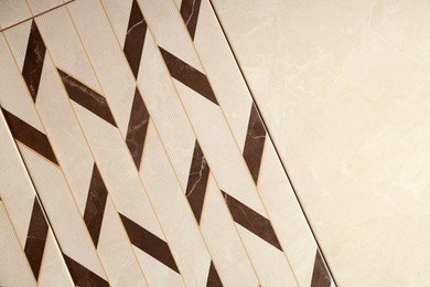 Photo of Texture of tiles with beautiful pattern as background, top view