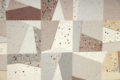 Photo of Texture of tiles with beautiful patterns as background, top view