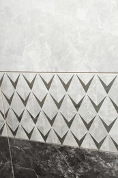 Photo of Samples of tiles with beautiful patterns as background, closeup