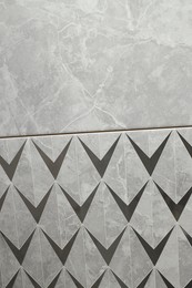 Photo of Samples of tiles with beautiful patterns as background, closeup