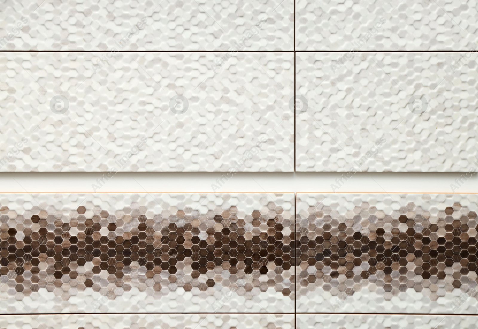Samples of tiles with beautiful patterns on display in store, closeup Photo of Samples of tiles with beautiful patterns on display in store, closeup
