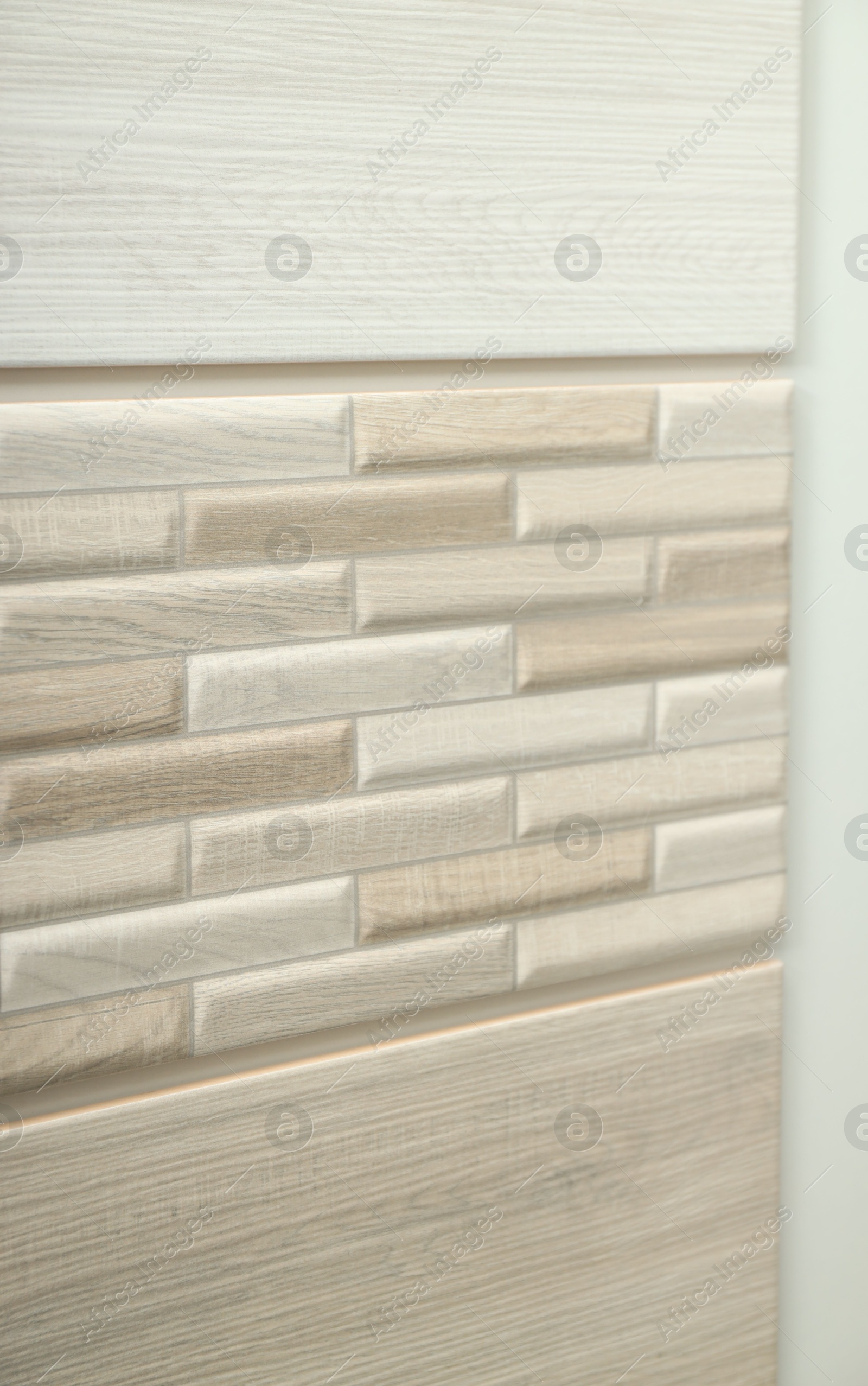 Samples of different tiles on display in store, closeup Photo of Samples of different tiles on display in store, closeup
