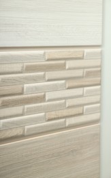 Photo of Samples of different tiles on display in store, closeup