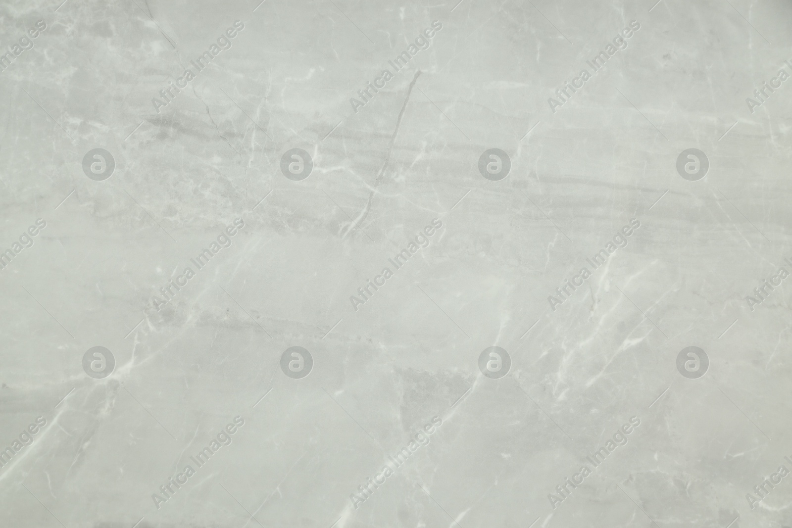 Texture of light grey marble tile as background, above view Photo of Texture of light grey marble tile as background, above view