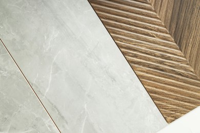 Photo of Different samples of tiles as background, top view