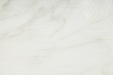 Photo of Texture of white marble tile as background, closeup