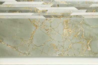 Photo of Texture of tile with beautiful pattern as background, closeup