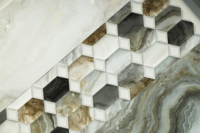 Photo of Texture of tiles with different patterns as background, top view