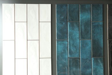 Photo of Different samples of tiles on display in store