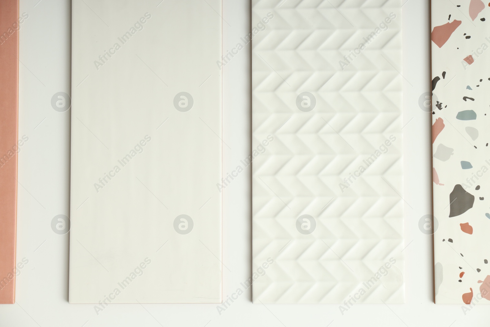 Samples of tiles with different patterns on display in store Photo of Samples of tiles with different patterns on display in store