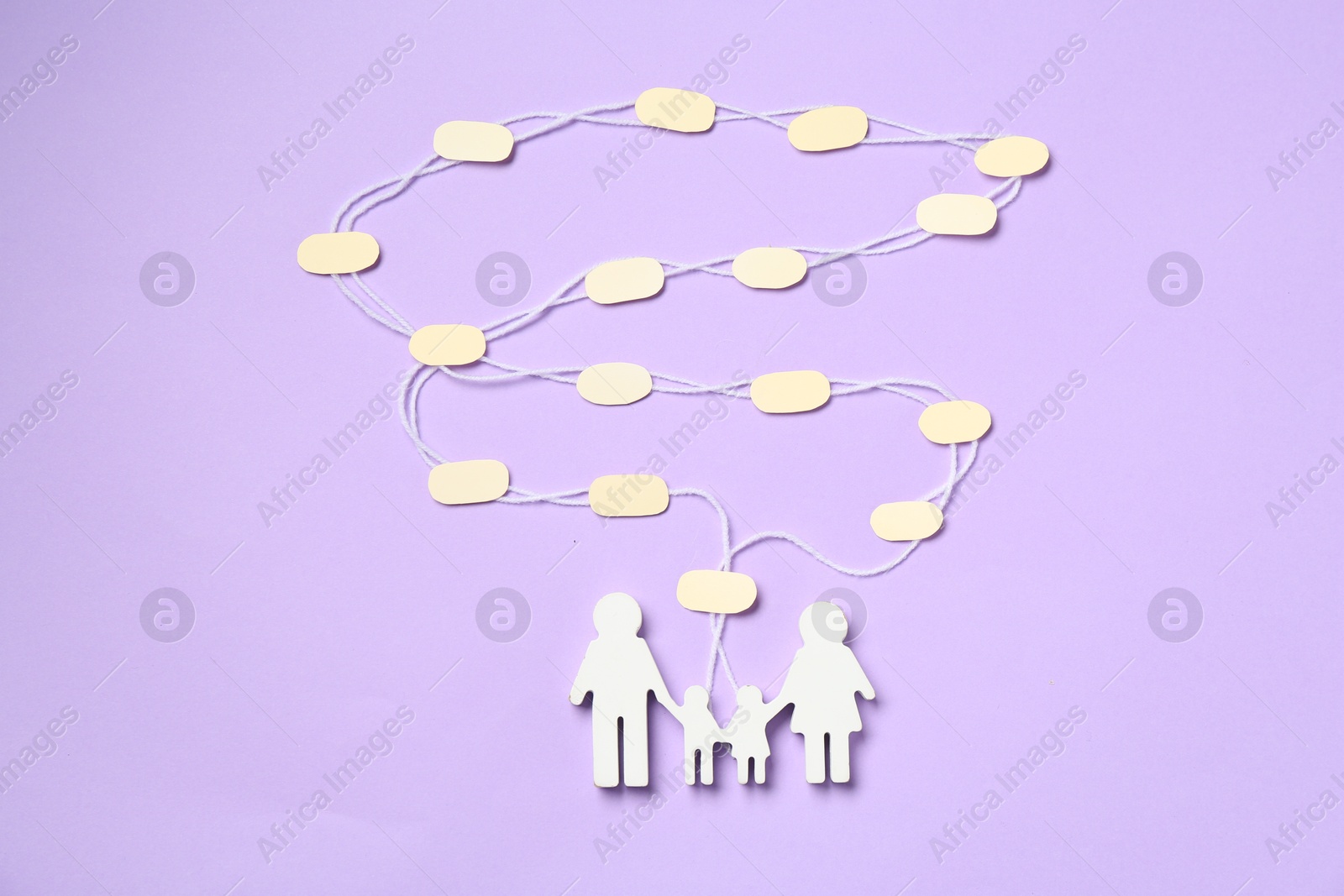 Family tree made with bubbles and people figure on lilac background, top view Photo of Family tree made with bubbles and people figure on lilac background, top view
