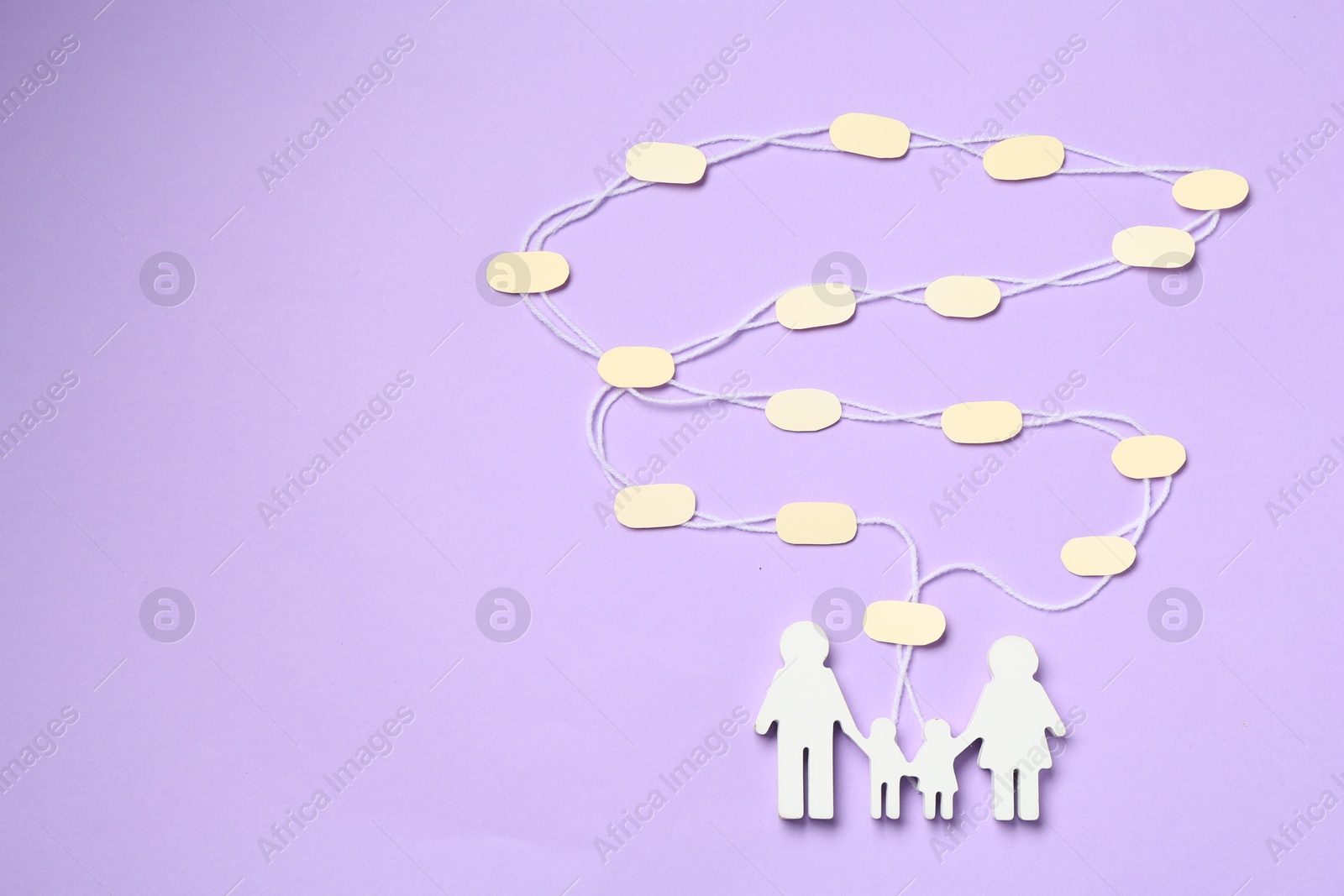 Family tree made with bubbles and people figure on lilac background, top view Photo of Family tree made with bubbles and people figure on lilac background, top view