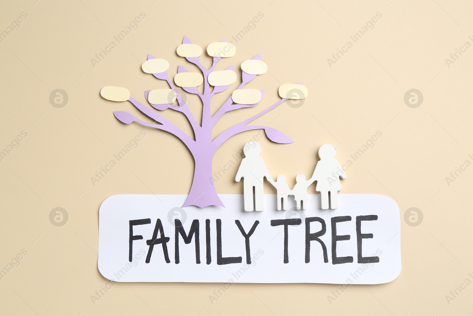 Family tree and people figure on beige background, top view Photo of Family tree and people figure on beige background, top view