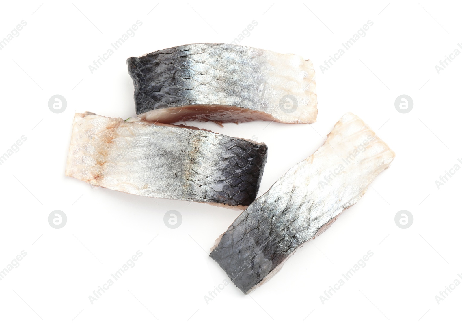 Pieces of delicious herring isolated on white, top view Photo of Pieces of delicious herring isolated on white, top view