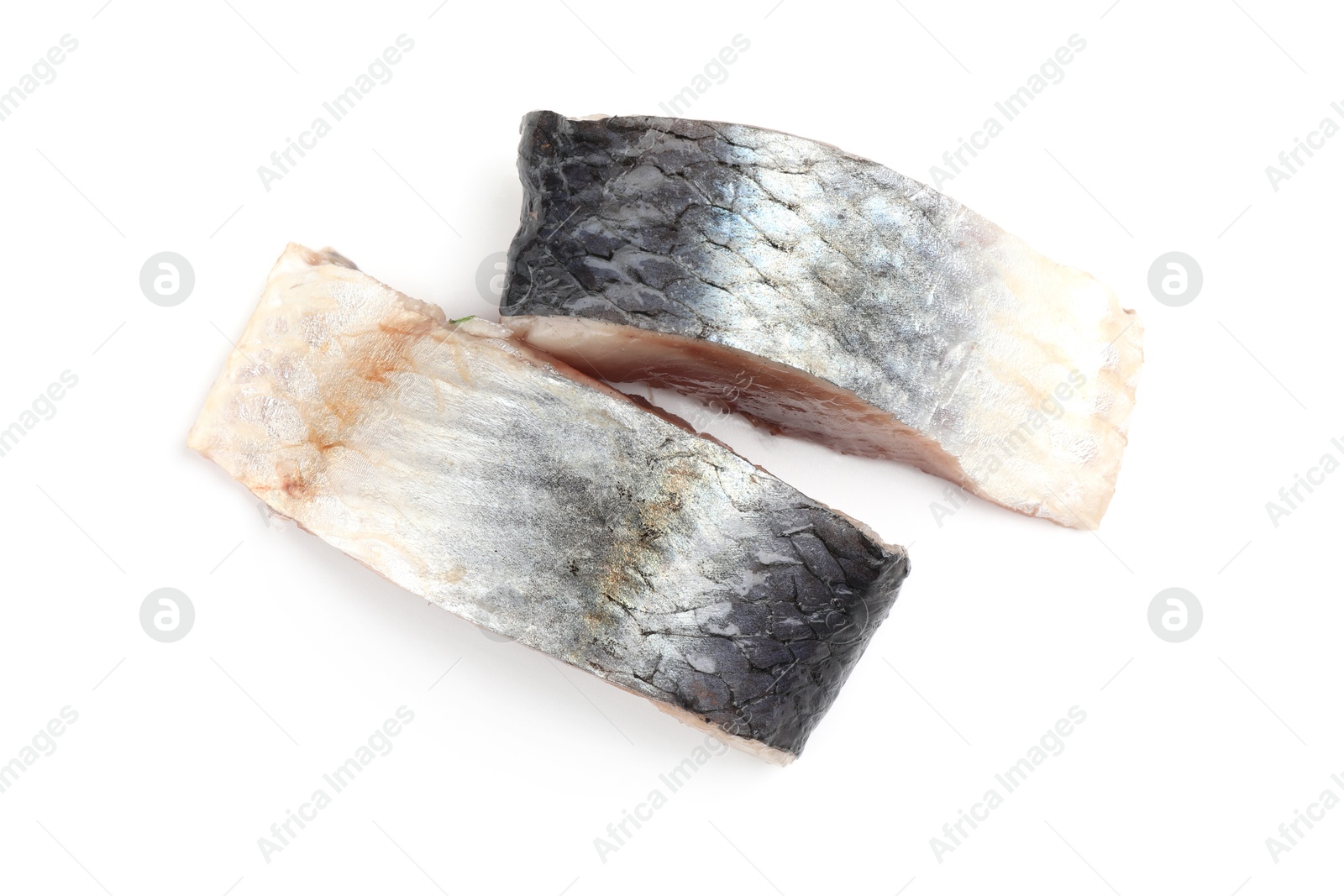 Pieces of delicious herring isolated on white, top view Photo of Pieces of delicious herring isolated on white, top view