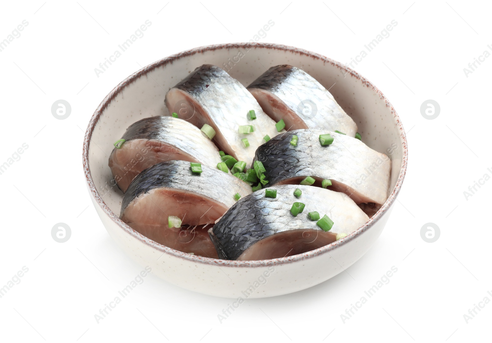 Pieces of delicious herring with green onions in bowl isolated on white Photo of Pieces of delicious herring with green onions in bowl isolated on white